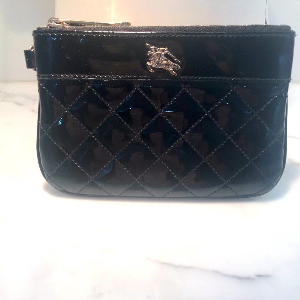 Sold: Burberry Patent leather quilted clutch